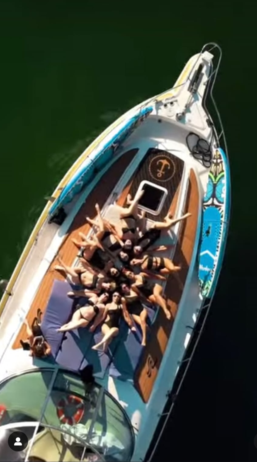Aerial view of yacht with guests